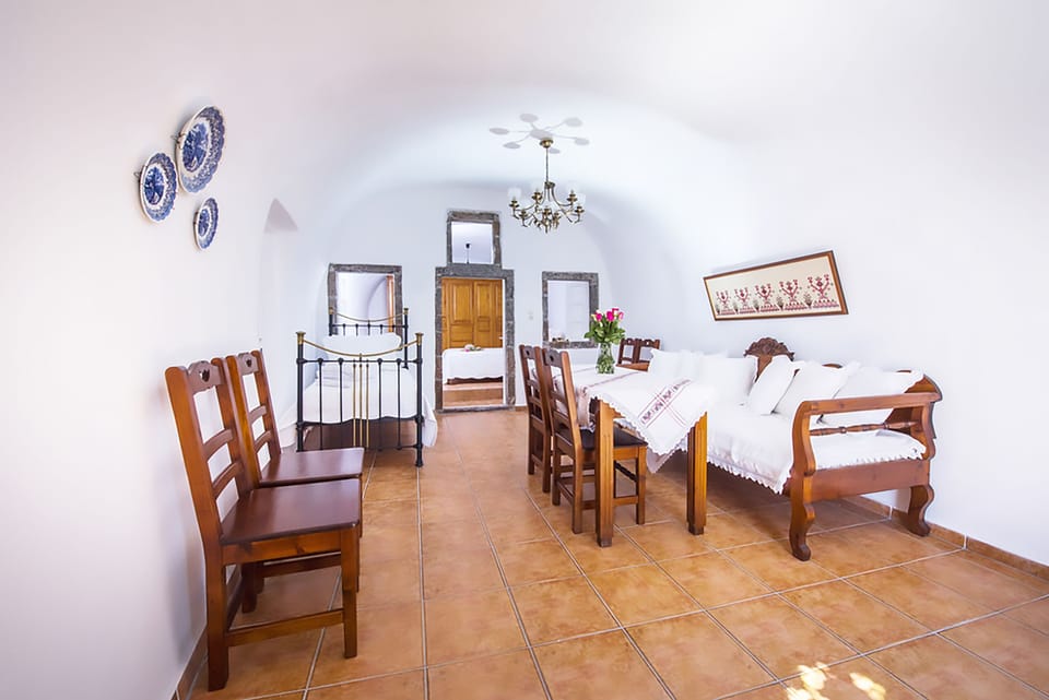 Traditional Villa, Jetted Tub, Sea View (Yposkafo) | Living area | Flat-screen TV