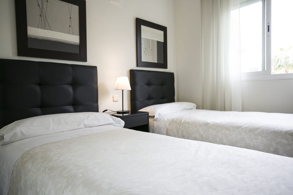 Apartment, 2 Bedrooms | 2 bedrooms, blackout drapes, iron/ironing board, free WiFi