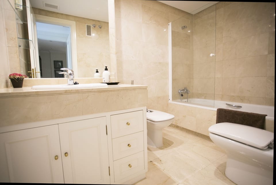 Apartment, 2 Bedrooms | Bathroom | Combined shower/tub, free toiletries, hair dryer, bidet
