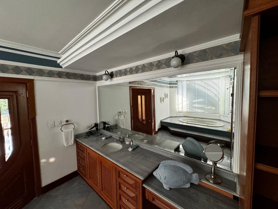 Exclusive Suite, 1 King Bed, Beach View, Beachfront | Bathroom | Free toiletries, hair dryer, towels, toilet paper
