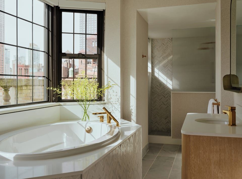 Premium Room, 1 King Bed, Jetted Tub (Bath Shower Combo) | Bathroom | Combined shower/tub, designer toiletries, hair dryer, bathrobes