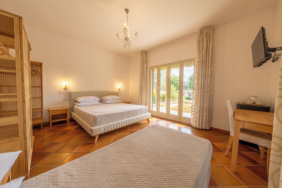 Exclusive Triple Room, 1 Bedroom, Terrace | Premium bedding, minibar, desk, soundproofing