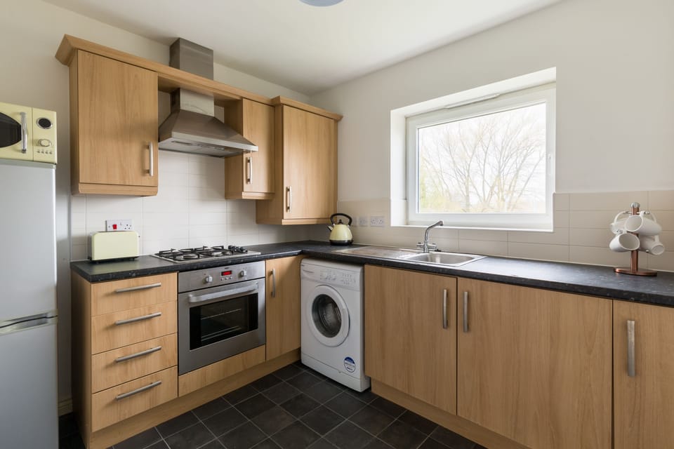 Family Apartment, 2 Bedrooms | Private kitchen | Full-size fridge, microwave, oven, stovetop
