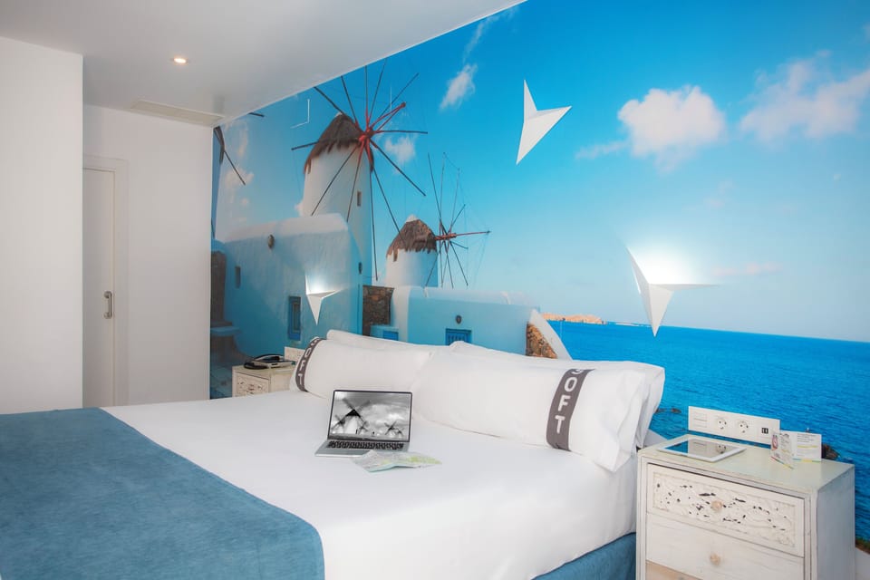 Economy Double Room | Minibar, individually decorated, desk, blackout drapes