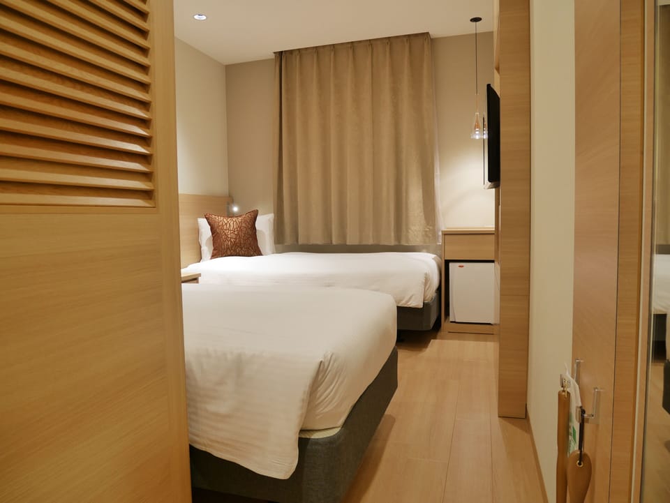 Premium bedding, down comforters, in-room safe, desk