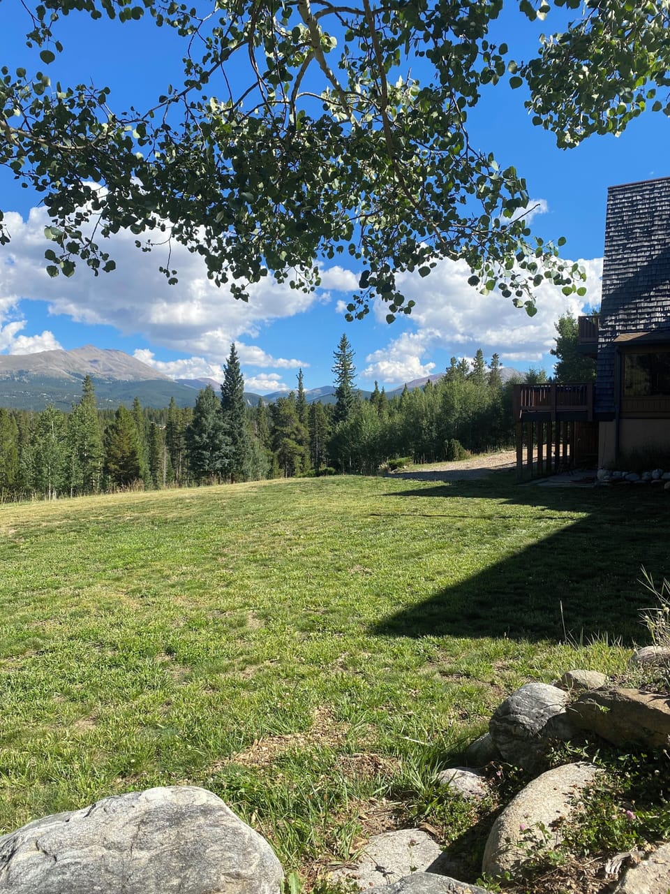 Large flat grassy lawn overlooking The Continental Divide.