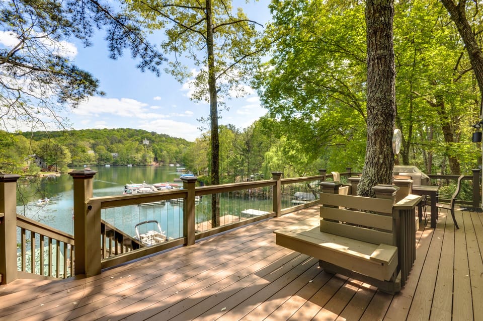 Built in seating on large deck.  Glass balusters and resin deck.