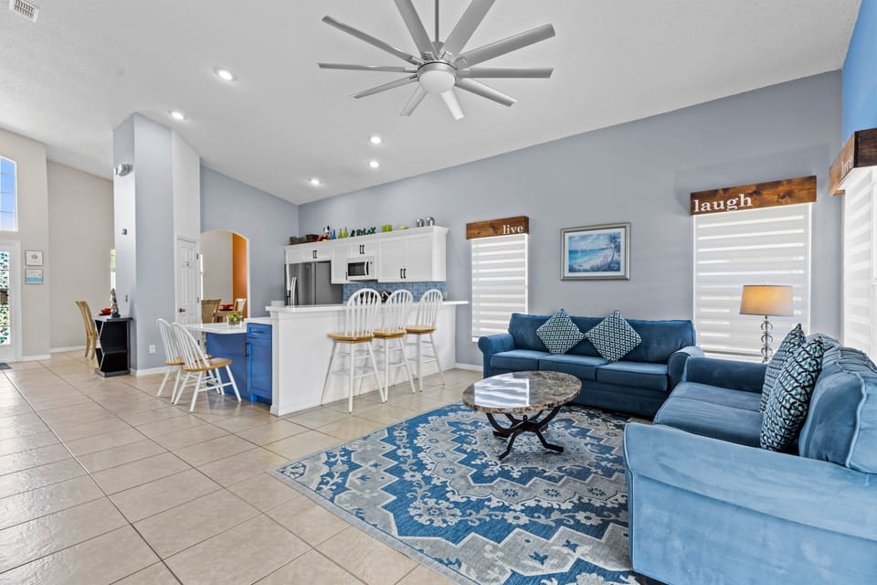 Living room with easy access to breakfast bar & cooking area