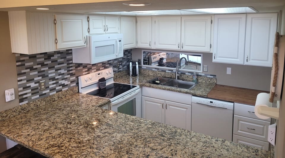Kitchen is fully equipped with everything you need for cooking