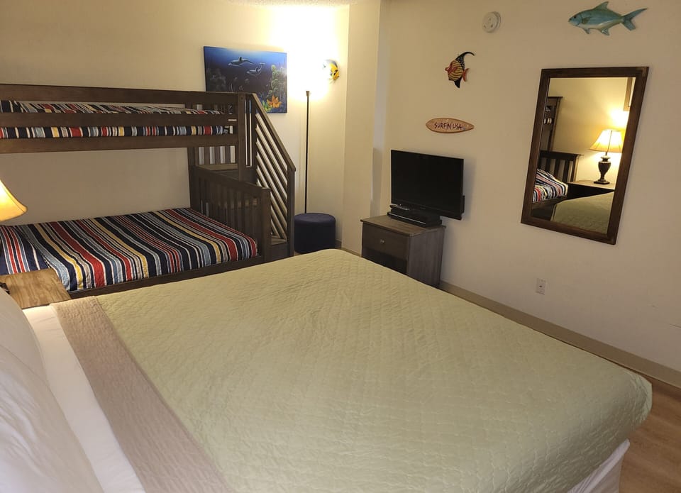 3rd bedroom: TV with a DVD player and a Playstation 2 (children's DVDs & games).