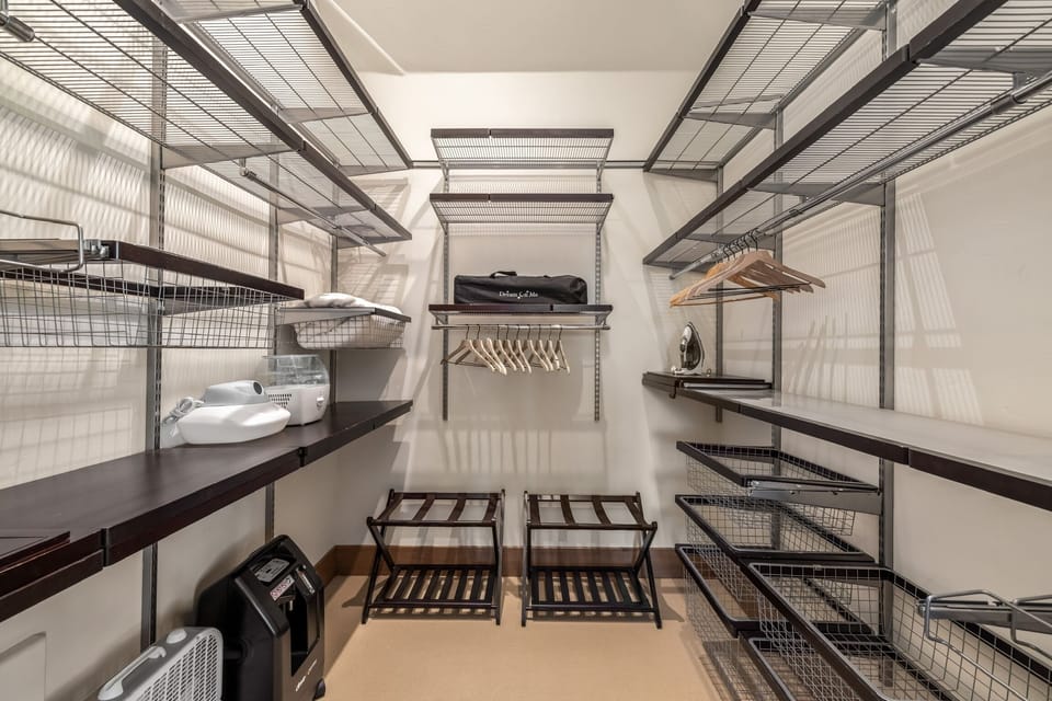Walk in Shower in the Primary Bedroom w/ extra Washer/Dryer.