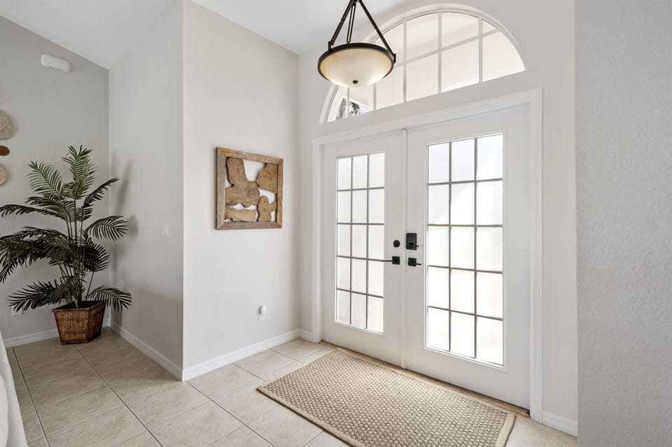 Spacious entryway designed for smooth arrivals and tidy shoes