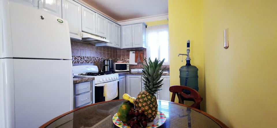 The fully equipped kitchen includes all you need to prepare delicious meals.