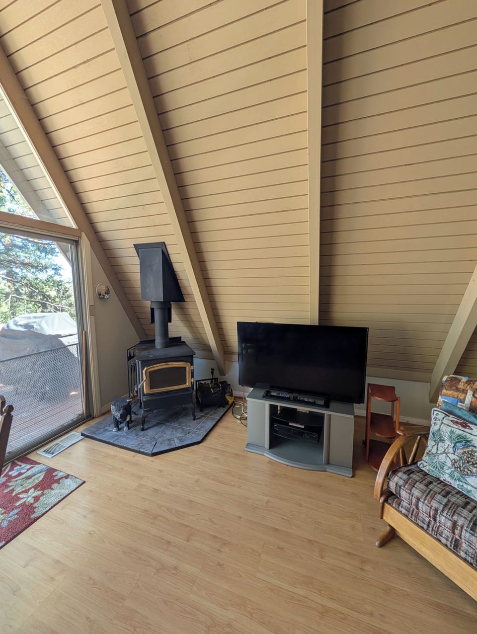 Living room with wood burning stove fireplace. 