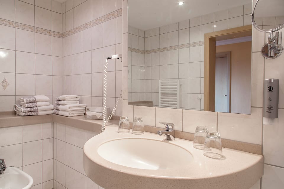 Family Double Room | Bathroom | Shower, hair dryer, towels, soap