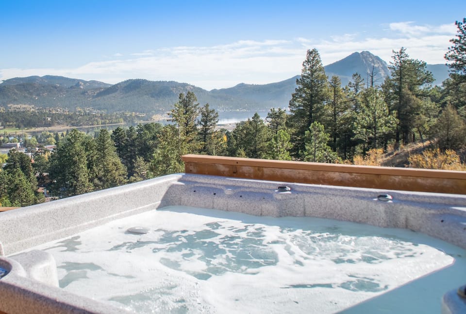 Hot tub has great mountain and lake views in a nice private area