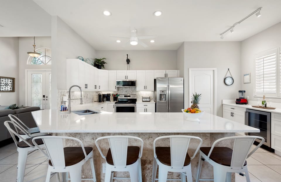 Oversized island with bar seating—perfect for breakfast or wine and conversation