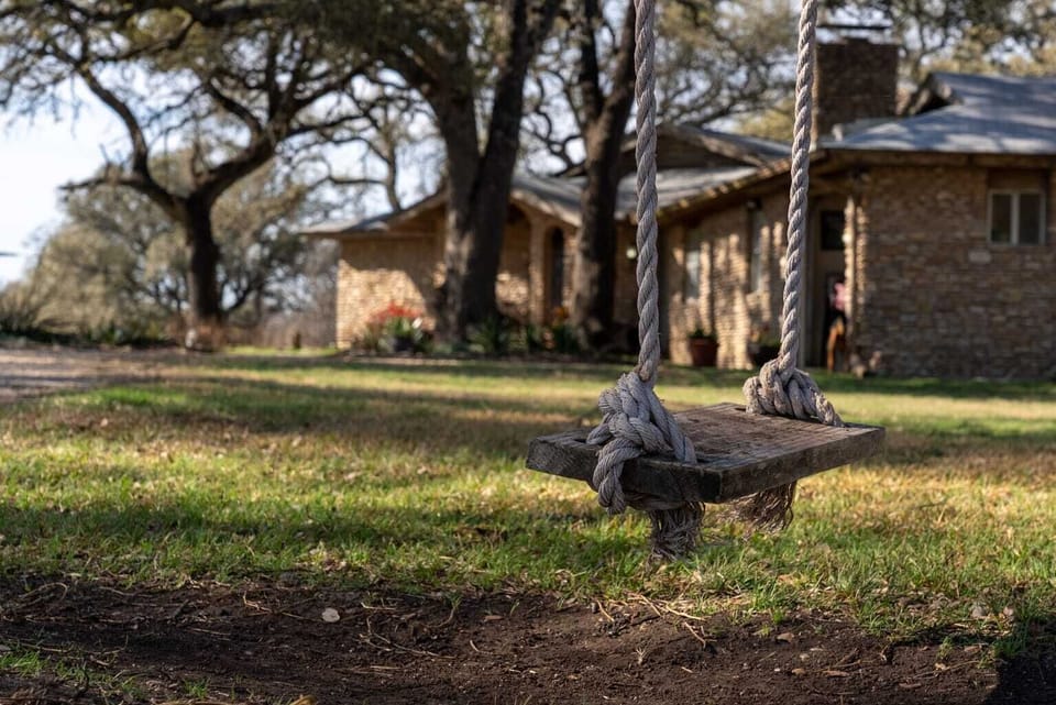 Enjoy this swing in a large live oak in front of Rocky Overlook