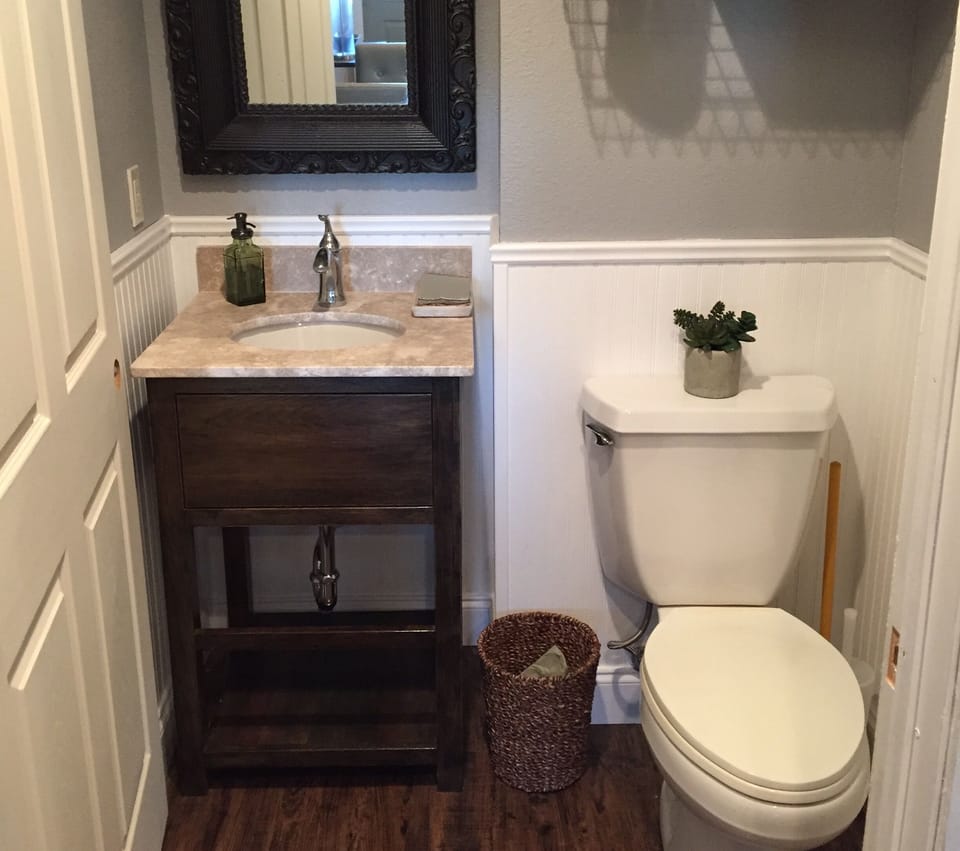 Half bathroom off of common area.