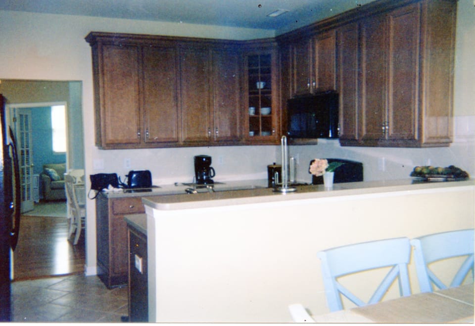 Full Kitchen with stove, oven, dishwasher and side by side regrigerator