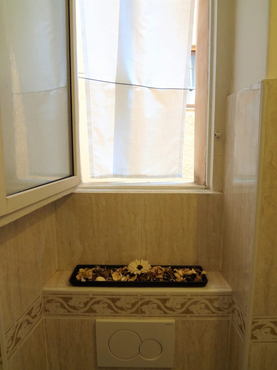 Bathroom. Overlooks an inner courtyard