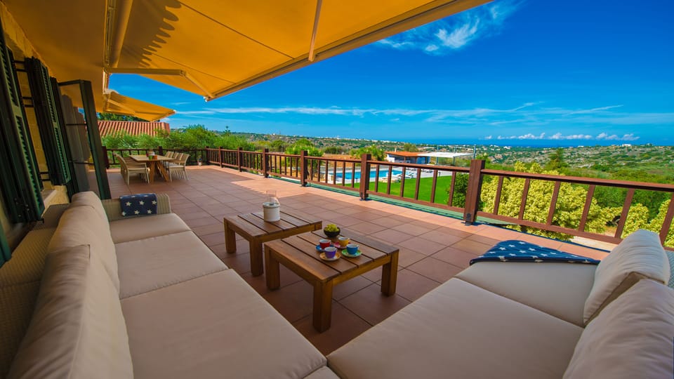 Shaded lounge area and shaded dining area on the 80 sq. m terrace.