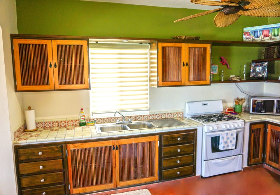 Kitchen with all the amenities like home, custom cabinetry & very open & bright