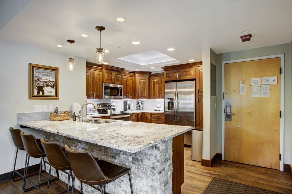 New walnut kitchen cabinets with granite counter tops. 