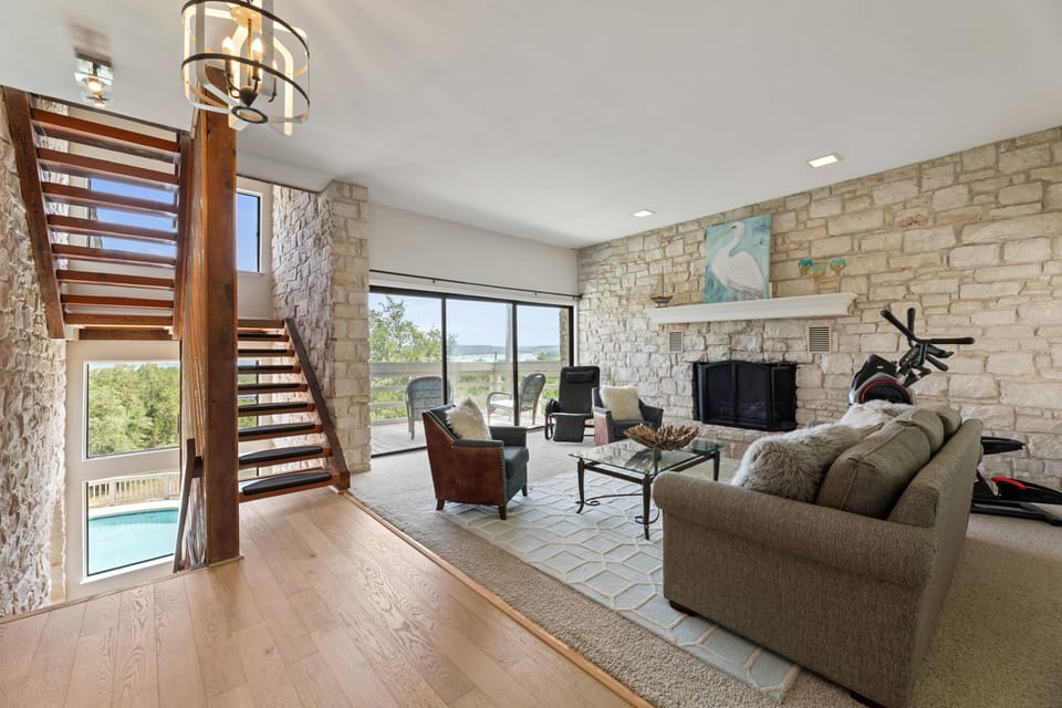 Entry and formal living room with fireplace.