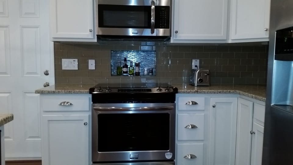 Gourmet Kitchen - Granite Counters, Glass Subway Tile, Stainless Appliances