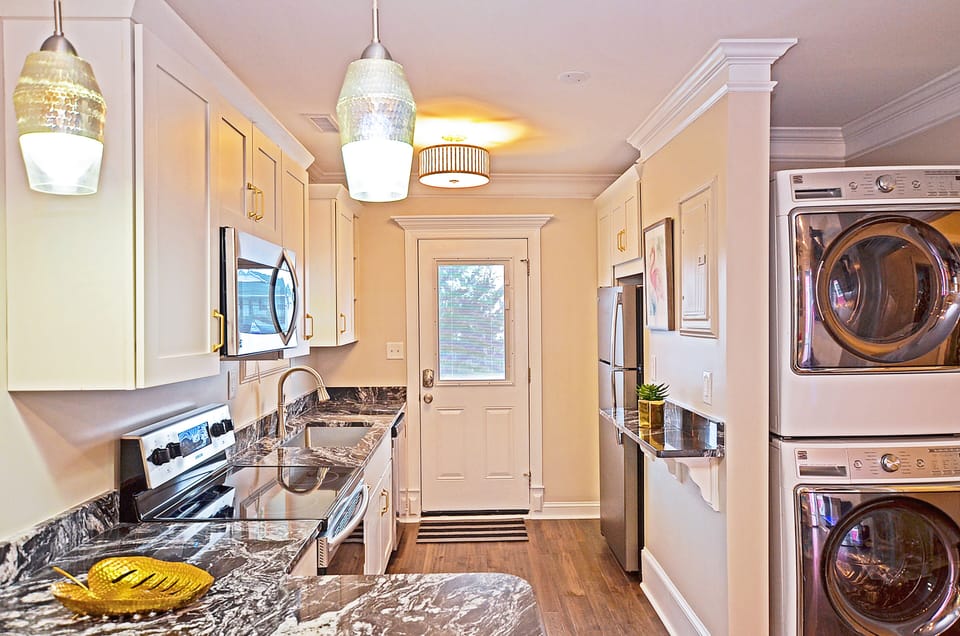 Brand new kitchen with stove, fridge, dishwasher, and built in microwave