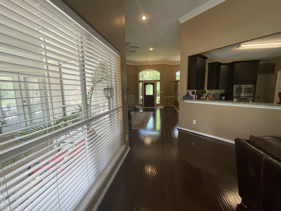 Lots of light with pool, forest, and meadow views