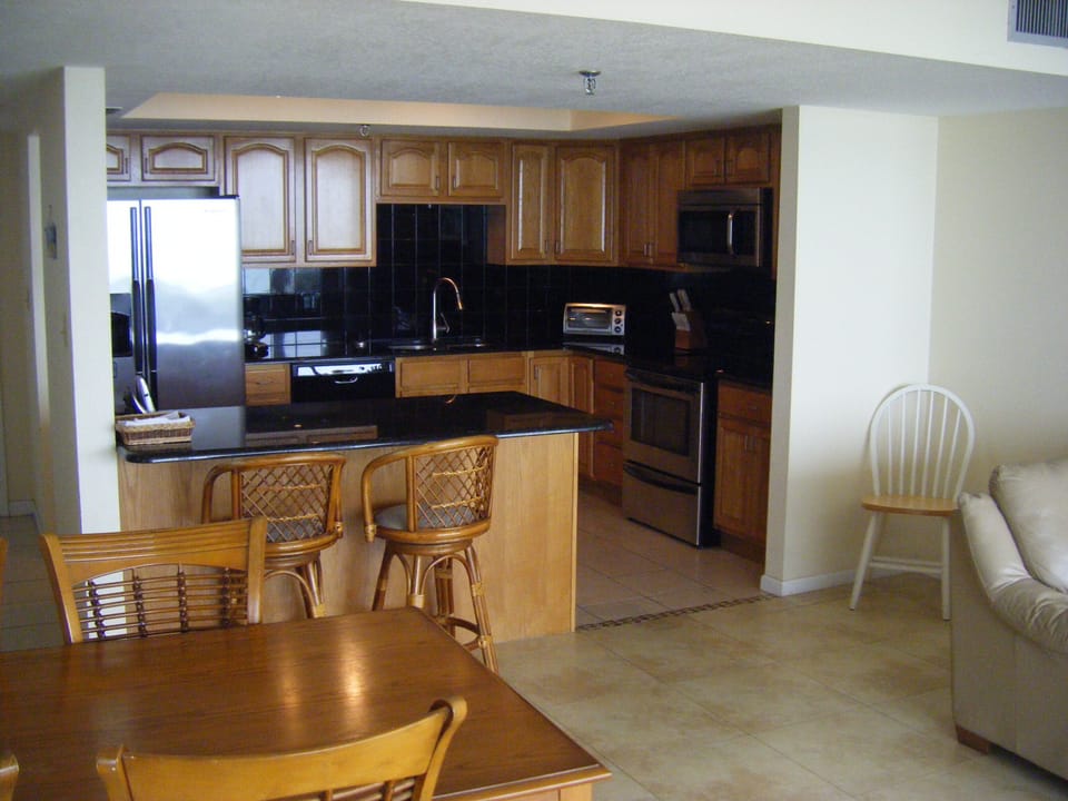 Bright and Open area from den back into kitchen