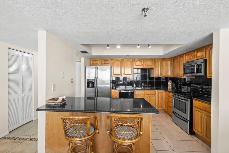 Breakfast bar for serving and entertaining in our beach front vacation condo