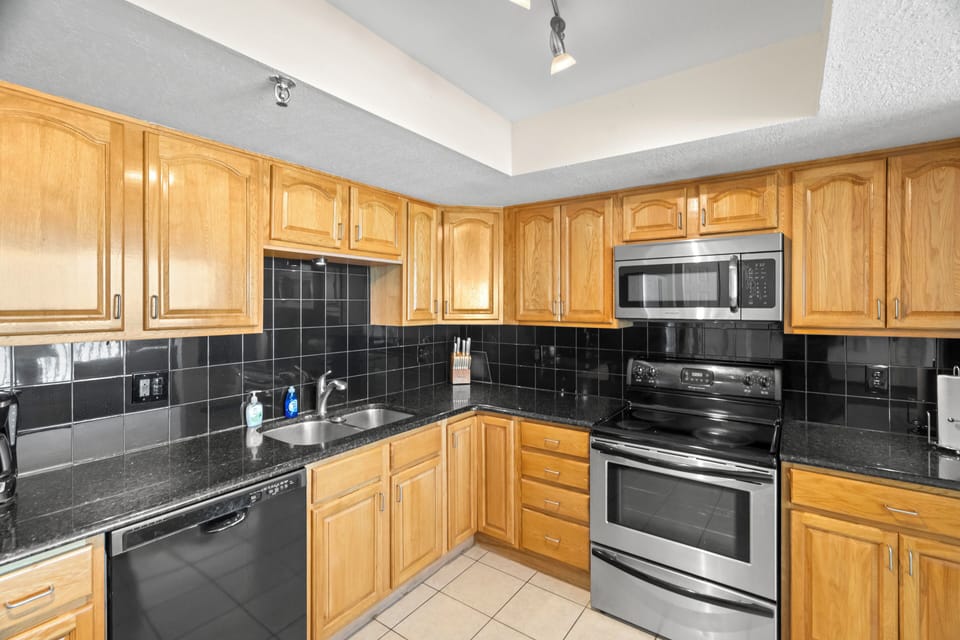 Modern large kitchen with all the appliances, cooking, and utensils to enjoy
