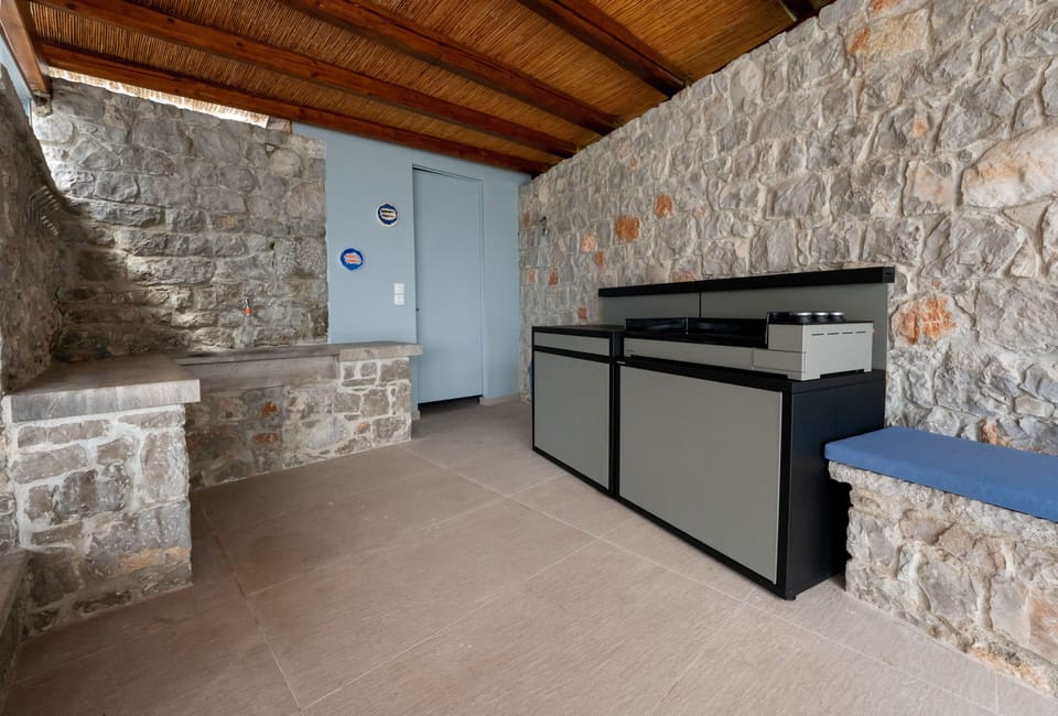 Outside kitchen and toilet