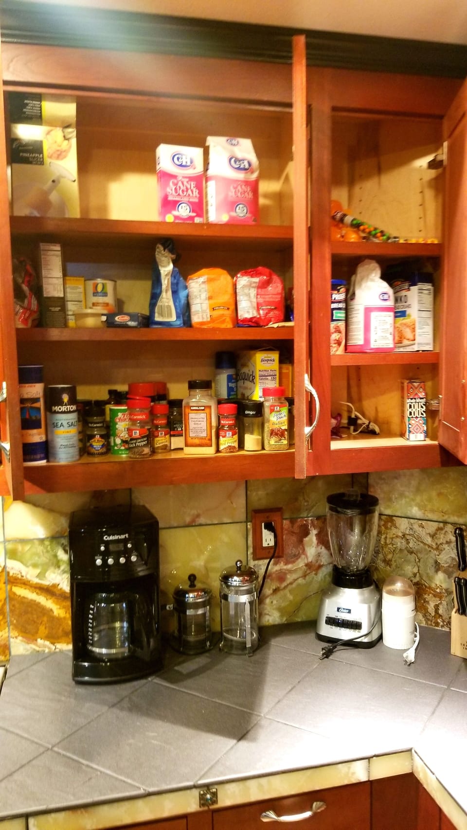 Stocked Pantry spices, flour, sugar ect. Blender Coffee maker, grinder,  presses