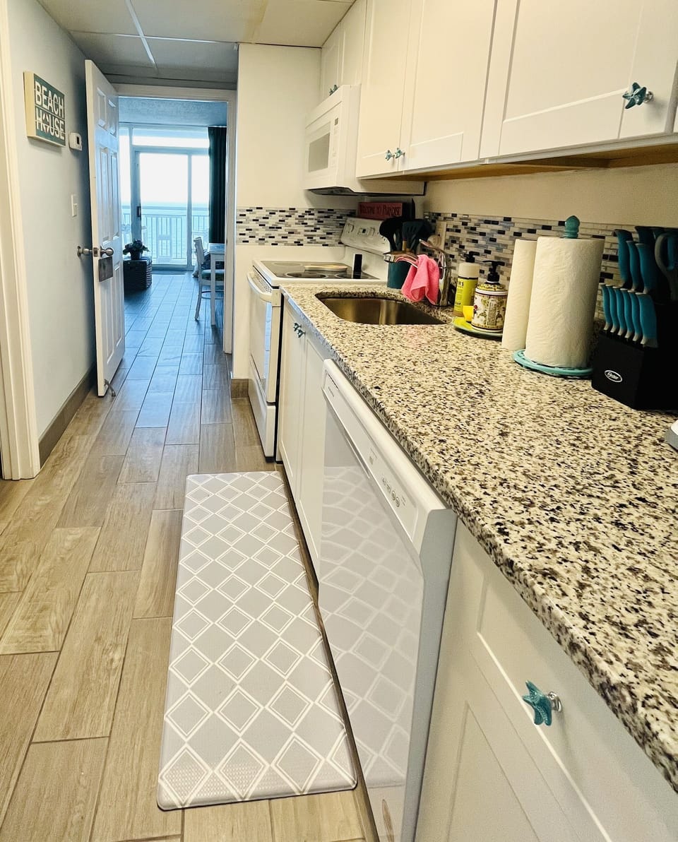 Beautiful, clean ceramic tile thru-out the condo. 