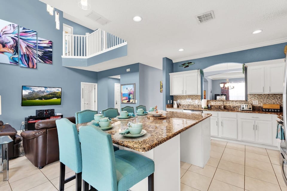 🍽️ "Whisk up delicious memories in our open kitchen, complete with everything you need for a gourmet getaway. From family breakfasts to romantic dinners, this kitchen is your stage for culinary excellence. Reserve your spot at the chef's table today!"