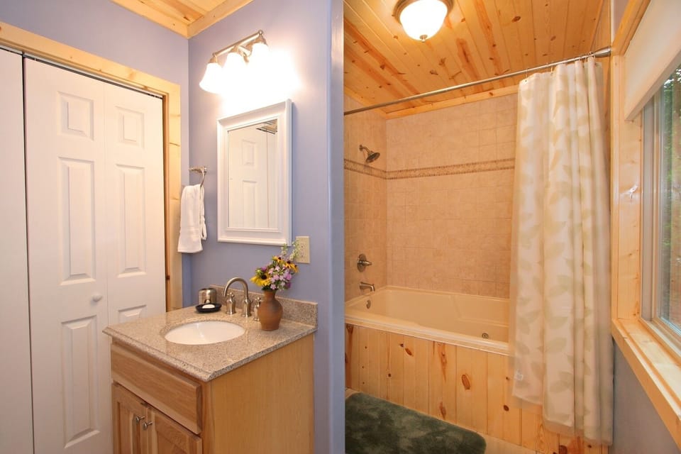 Downstairs bathroom includes full sized washer and dryer. 