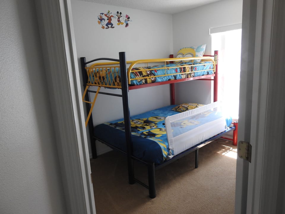 5th bedroom bunk beds one twin and one double
various Disney themes