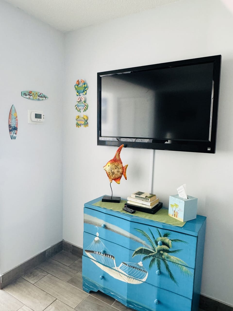 Living room TV and entertainment cabinet: DVDs, games, cards, books, more! 🏝️