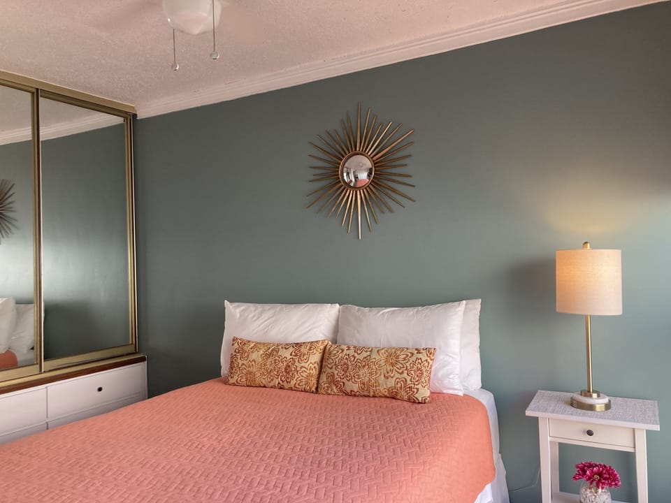 Bedroom with built-in draws and closet
