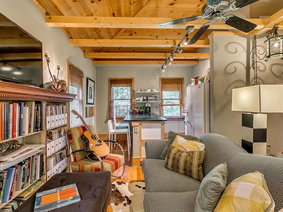  Large windows and natural light encircling perimeter of the studio.