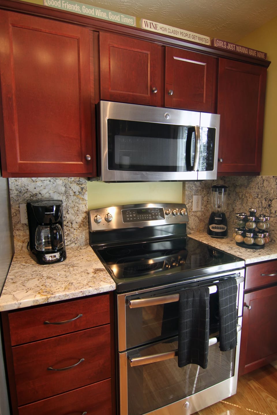 Kitchen Cooking area.  Stocked for the chef including a full selection of spices