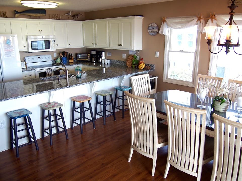 Open kitchen and dining room - great for cooking while gazing at the ocean!