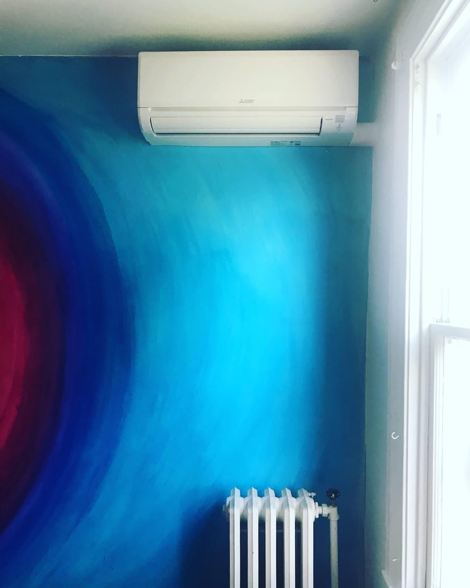 Radiator heat and ductless AC units in each bedroom
