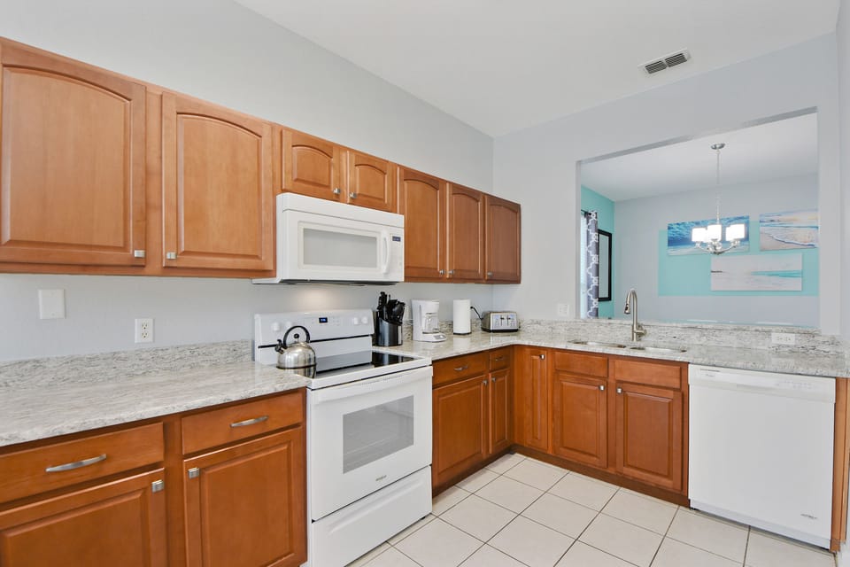 The eat in kitchen with new granite countertops.