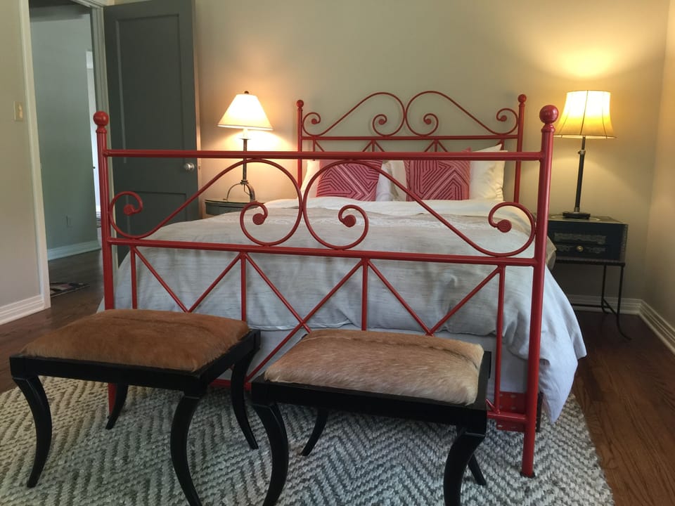 Spacious bedroom Queen size bed Serta pillow top mattress..