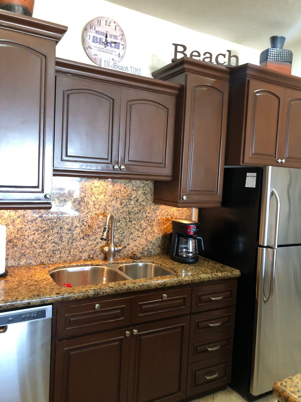 Kitchen showing large 12 cup Mr. Coffee maker. 